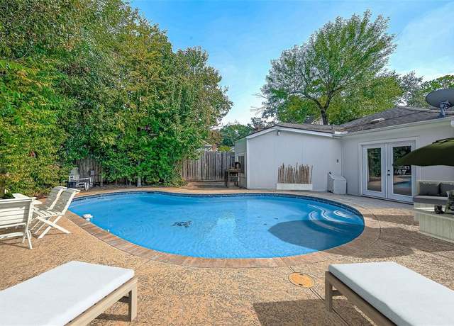 Property at 12318 Queensbury Ln, Houston, TX 77024, 4 beds, 2 baths