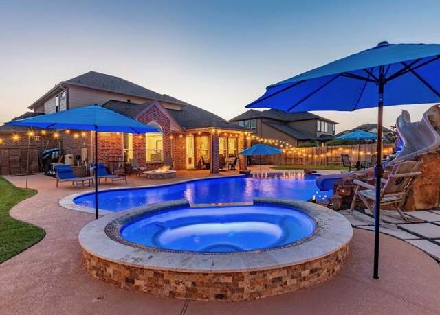 Property at 9218 Joe Louis Dr, Mont Belvieu, TX 77523, 4 beds, 3.5 baths