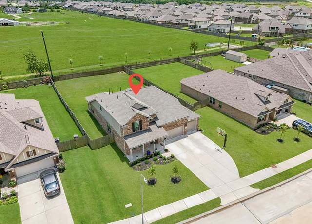 Property at 15010 Lake Shore Ave, Mont Belvieu, TX 77523, 5 beds, 4 baths