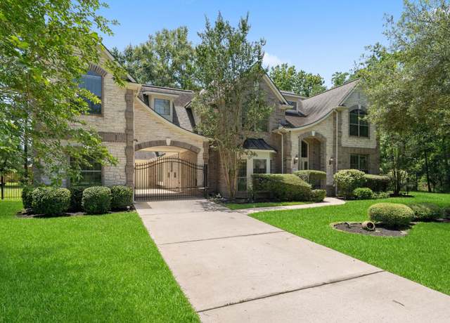 Property at 9050 Forest Cliff Ct, Conroe, TX 77302, 5 beds, 4 baths