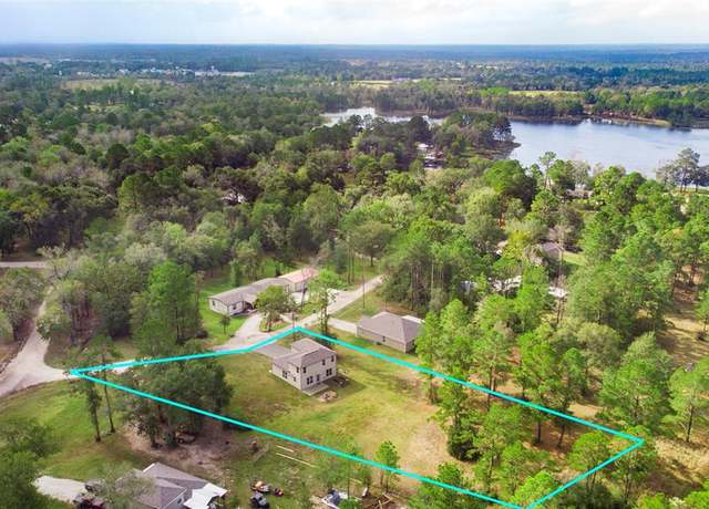Property at 4 Big Lake Cir, Huntsville, TX 77320, 4 beds, 2.5 baths