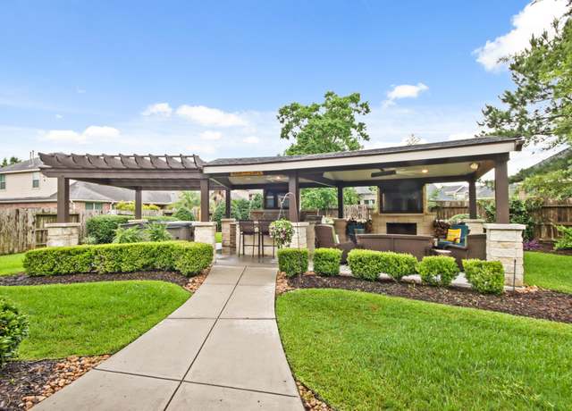 Property at 8307 Floating Heart Ct, Conroe, TX 77385, 4 beds, 3.5 baths