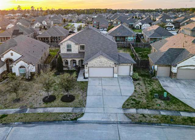 Property at 21623 Flowering Crab Apple Dr, Porter, TX 77365, 4 beds, 3.5 baths