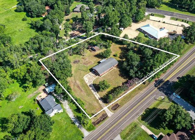 Property at 1857 Hwy 30 E, Huntsville, TX 77320, 3 beds, 2 baths