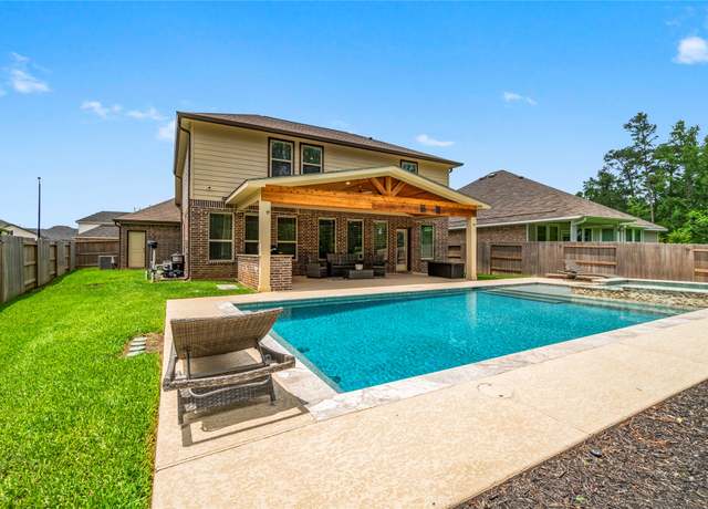Property at 719 Ivory Creek Ct, Willis, TX 77378, 5 beds, 3.5 baths