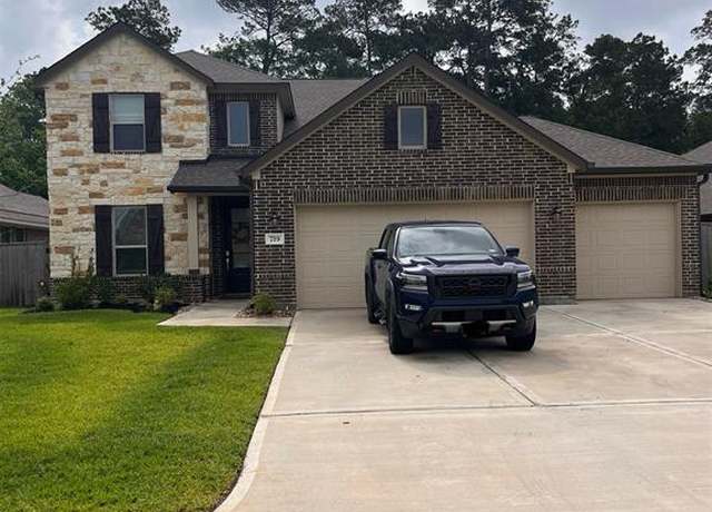 Property at 719 Ivory Creek Ct, Willis, TX 77378, 5 beds, 3.5 baths