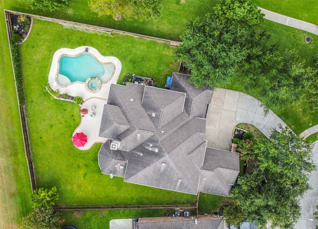 Property at 12111 Wind Cove Place Ct, Humble, TX 77346, 5 beds, 4 baths