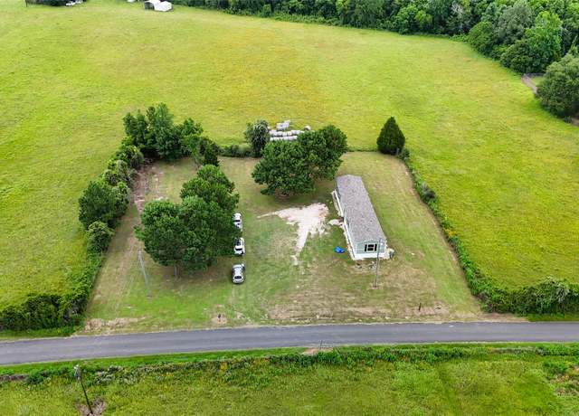 Property at 1446 County Road 2107, Liberty, TX 77575, 3 beds, 2 baths