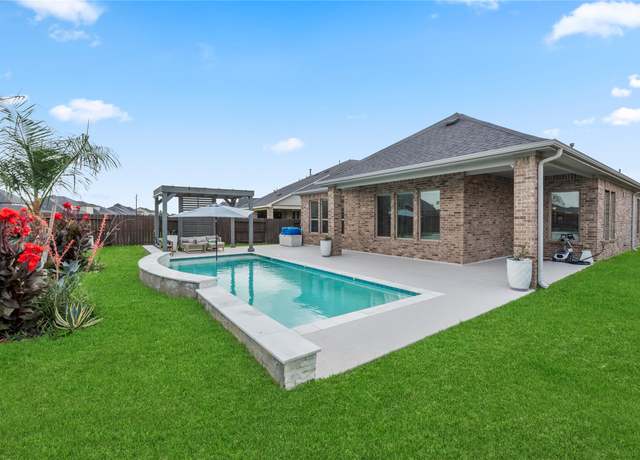 Property at 29510 Enchanted Breeze Ln, Katy, TX 77494, 4 beds, 3.5 baths