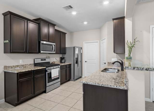 Property at 7623 Square Garden Ln, Conroe, TX 77304, 4 beds, 2.5 baths