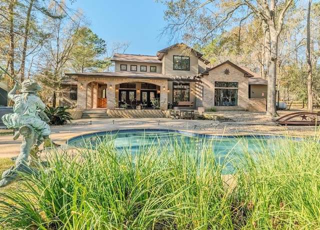 Property at 11409 Oak Springs Dr, Willis, TX 77378, 4 beds, 3.5 baths