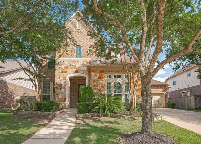 Property at 10002 Hutton Park Dr, Katy, TX 77494, 5 beds, 4 baths