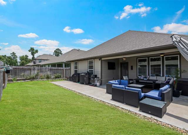Property at 14320 Yellow Hawthorn Ct, Conroe, TX 77384, 4 beds, 3 baths