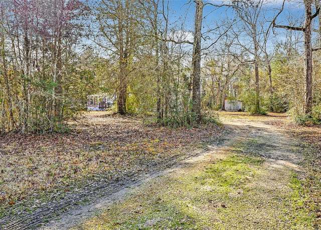 Property at 688 County Road 3141 E, Cleveland, TX 77327, 3 beds, 2 baths