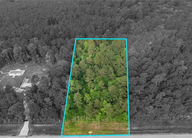 Property at 32-22-11 Grey Feather Rd, Huntsville, TX 77340
