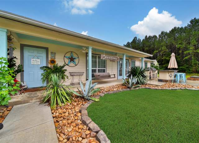 Property at 757 Big Woods Rd, New Waverly, TX 77358, 5 beds, 2 baths