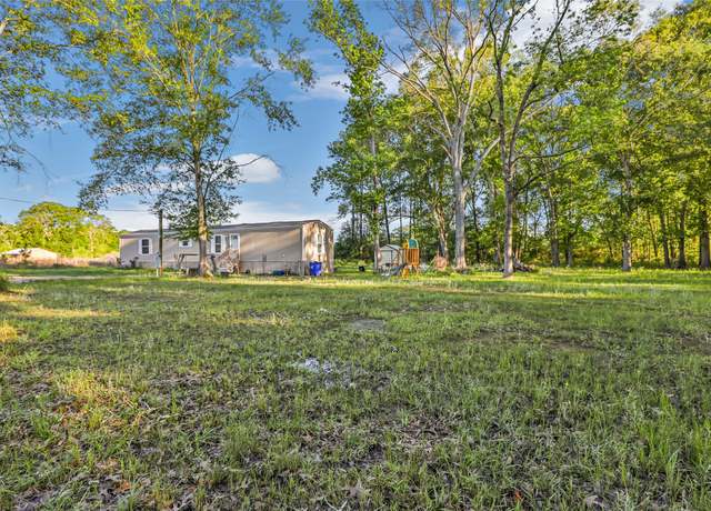 Property at 1027 County Road 3141 E, Cleveland, TX 77327, 3 beds, 2 baths