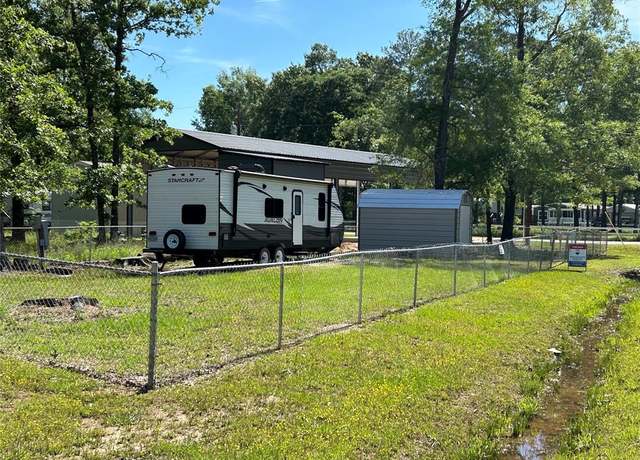 Property at 411 Woodland Shrs, Point Blank, TX 77364