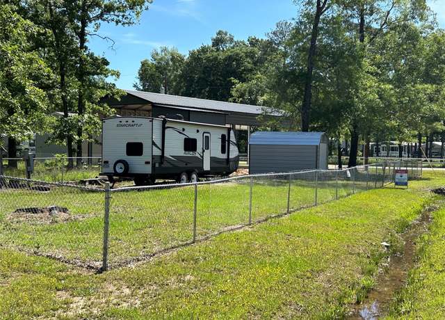 Property at 411 Woodland Shrs, Point Blank, TX 77364