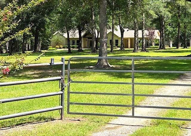 Property at 10671 Tanyard Rd, Willis, TX 77378, 3 beds, 3 baths