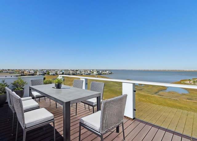 Property at 830 Tiki Dr, Tiki Island, TX 77517, 3 beds, 3 baths