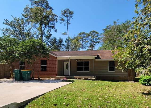 Property at 1118 E Cedar River Rd, Conroe, TX 77316, 4 beds, 2 baths