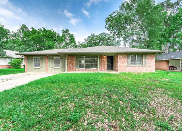 Property at 1704 N Thompson St, Conroe, TX 77301, 4 beds, 3 baths
