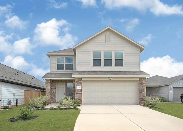 Property at 227 River Grove St, Willis, TX 77378, 4 beds, 2.5 baths