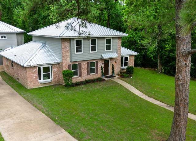Property at 10311 Woodhollow Dr, Conroe, TX 77385, 4 beds, 2.5 baths