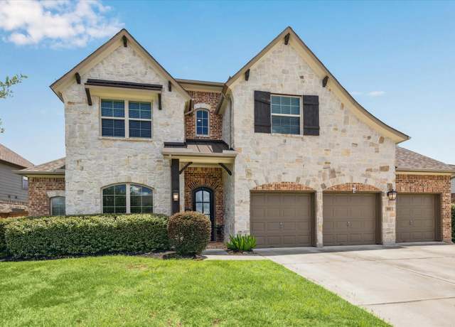 Property at 702 Red Elm Ln, Conroe, TX 77304, 4 beds, 3.5 baths