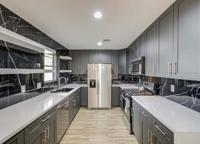 Property at 1939 Woodvine Dr, Houston, TX 77055, 5 beds, 5 baths