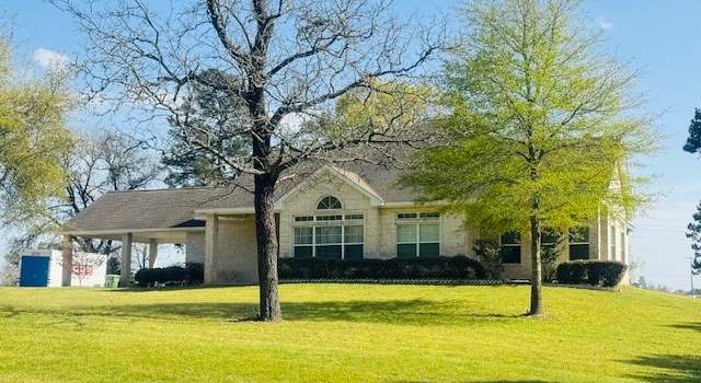 Photo of 7 Autumn Way, Huntsville, TX 77320