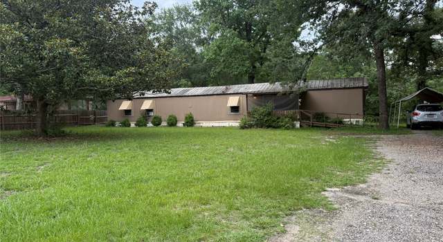 Photo of 11928 Hairston Dr, Willis, TX 77318