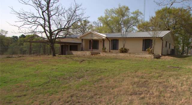 Photo of 8 Dogwood Ln, Huntsville, TX 77320