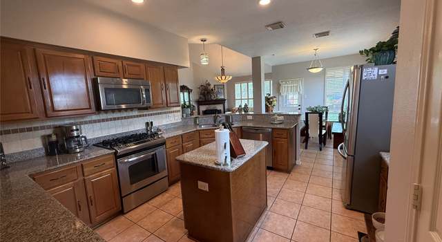 Photo of 12218 Meadowglen Ct, Meadows Place, TX 77477