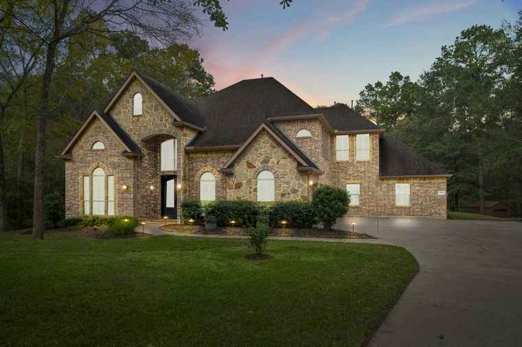 Photo of 9643 Longmire Creek Way Conroe, TX 77304