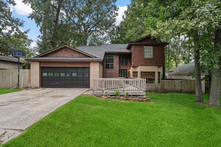 Photo of 122 April Wind Dr E Conroe, TX 77356