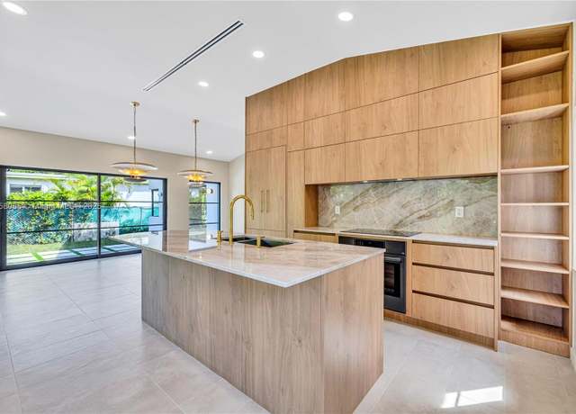 Property at 1323 Cleveland Rd, Miami Beach, FL 33141, 4 beds, 3 baths