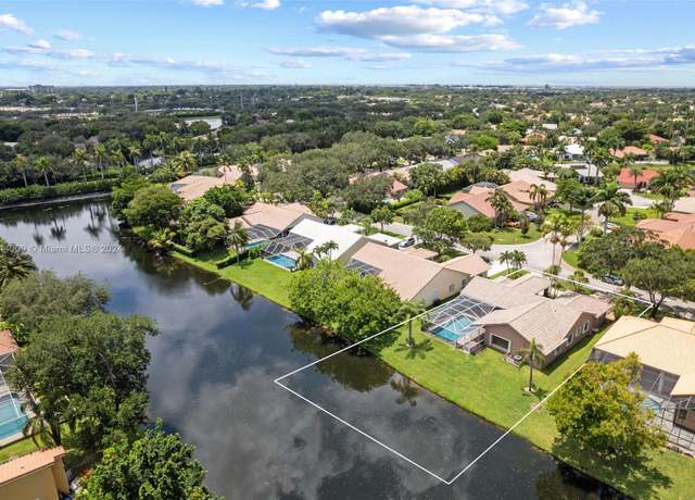 Property at 5001 NW 103rd Ave, Coral Springs, FL 33076, 4 beds, 3 baths