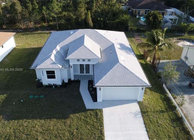 Property at 3005 52nd St W, Lehigh Acres, FL 33971, 4 beds, 2 baths