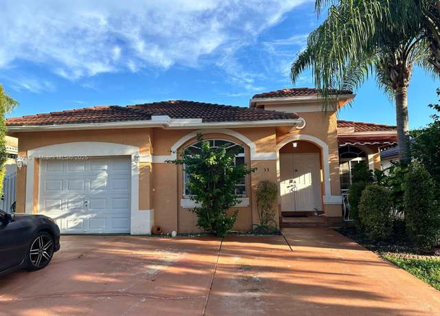 Property at 7733 NW 200th St, Hialeah, FL 33015, 3 beds, 2 baths