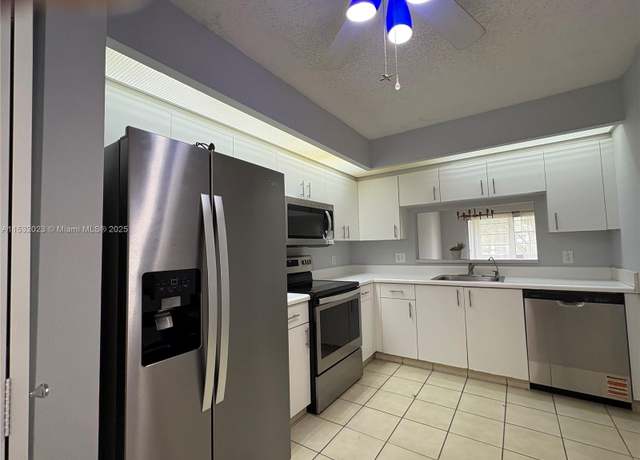 Property at 12755 SW 16th Ct Unit 211B, Pembroke Pines, FL 33027, 2 beds, 1.5 baths