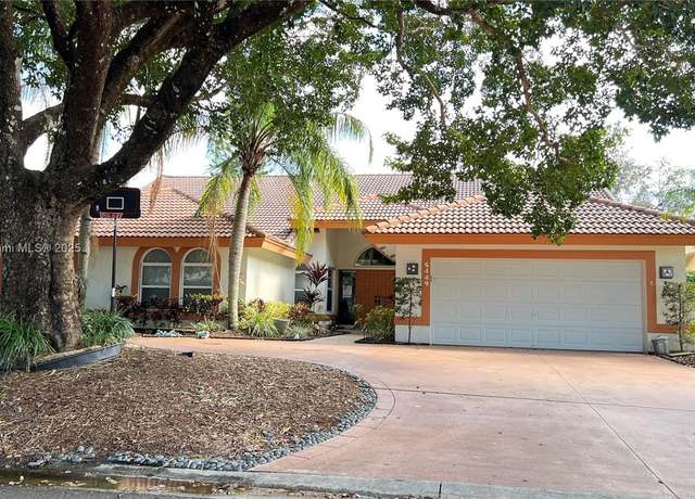 Property at 5449 NW 86th Ter, Coral Springs, FL 33067, 4 beds, 3 baths