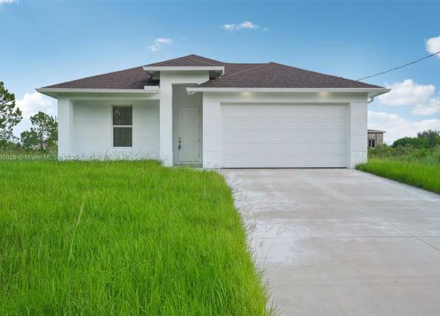 Property at 6012 Paula Ave N, Lehigh Acres, FL 33971, 4 beds, 2 baths