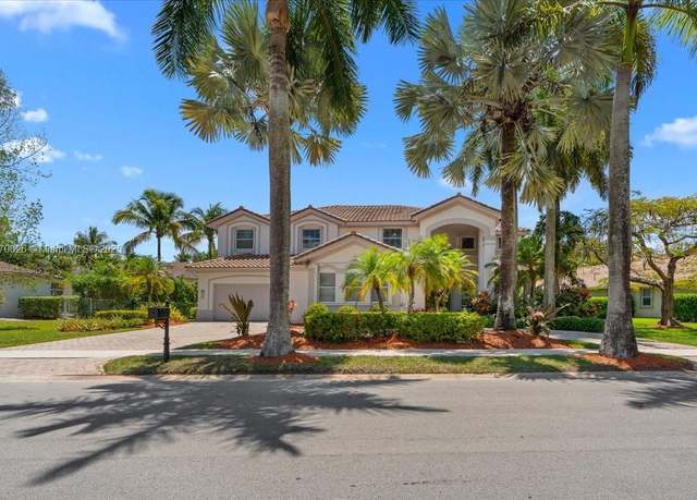 Property at 1427 Victoria Isle Dr, Weston, FL 33327, 5 beds, 4.5 baths