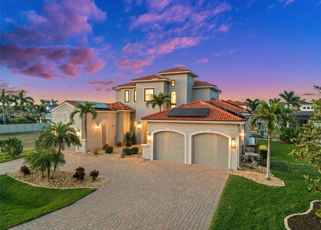 Property at 123 SW 53rd St, Cape Coral, FL 33914, 5 beds, 5.5 baths