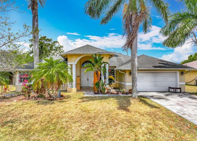 Property at 375 SW Dustin Ave, Port St. Lucie, FL 34953, 5 beds, 3 baths