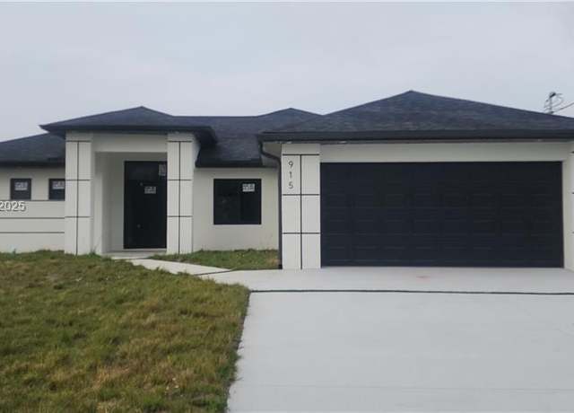 Property at 915 Panda Ave, Lehigh Acres, FL 33974, 3 beds, 2 baths