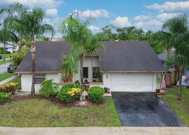 Property at 9300 NW 32nd Mnr, Sunrise, FL 33351, 3 beds, 2 baths