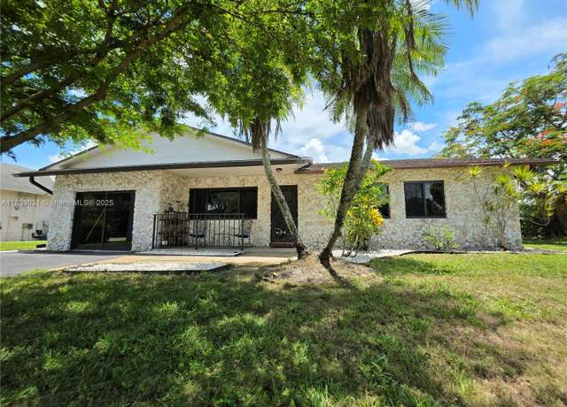 Property at 10120 NW 71st Pl, Tamarac, FL 33321, 3 beds, 2.5 baths